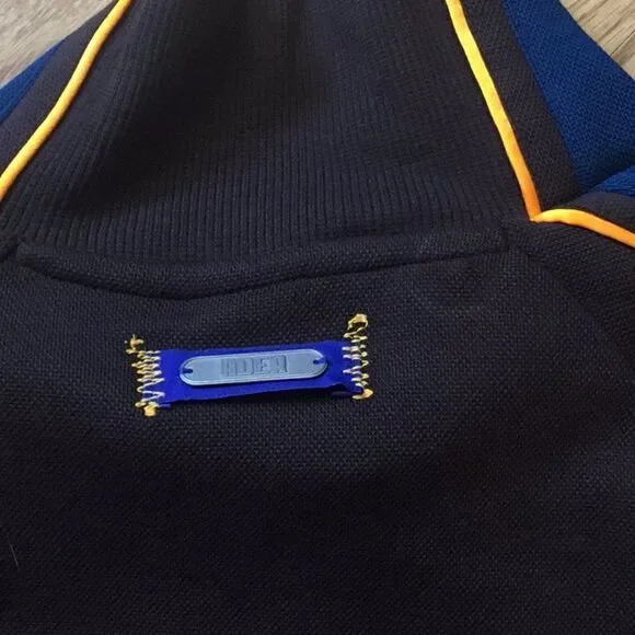 NWT PUMA sweatshirt in brown with blue & orange